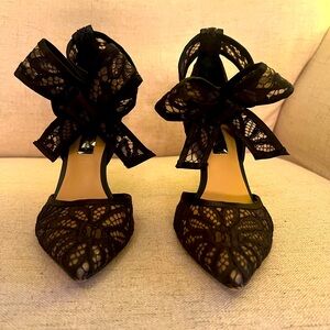 Black dress heels with a bow on the side